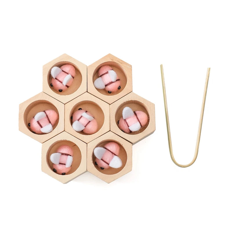 Introduce your Little One to a world of color, coordination, and creativity with our Wooden Beehive Game. Designed as a fun and educational Montessori toy, this interactive set features 7 basswood honeycomb beehives and 7 felt bees, providing endless opportunities for learning through play.