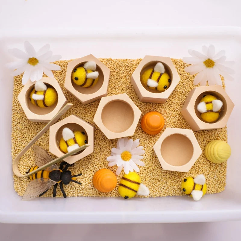 Introduce your Little One to a world of color, coordination, and creativity with our Wooden Beehive Game. Designed as a fun and educational Montessori toy, this interactive set features 7 basswood honeycomb beehives and 7 felt bees, providing endless opportunities for learning through play.