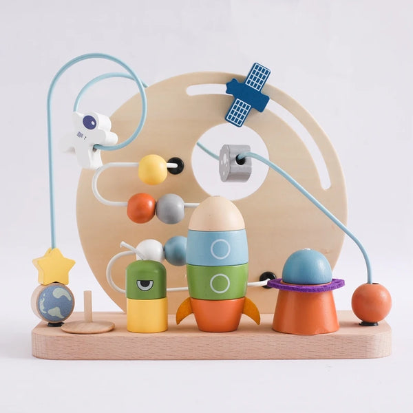 Introduce your Little One to the wonders of learning with our Montessori Wooden Beaded Planet Toy! This beautifully crafted wooden toy is designed to stimulate early learning, enhance hand-eye coordination, and improve finger grip.