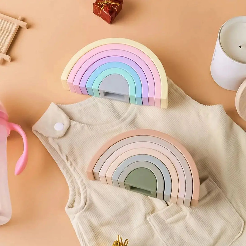 Introduce your little one to a world of color, creativity, and sensory development with our Rainbow Stacking Toy. This versatile montessori toy encourages imaginative play while enhancing motor skills and hand-eye coordination. Made from soft silicone, the stackable rainbow pieces also double as a teether toy, offering soothing relief for your baby’s gums during teething stages.